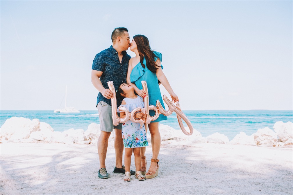 baby announcement on the beach