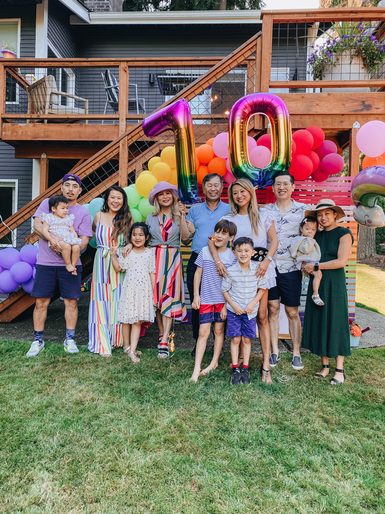 family at rainbow theme party