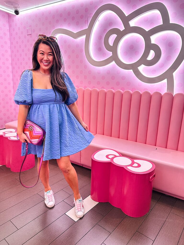 pink sneakers with dress outfit